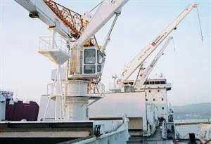Marine electro-hydraulic deck cranes